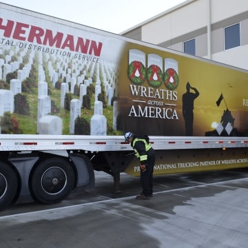 a truck is parked on the side of a road