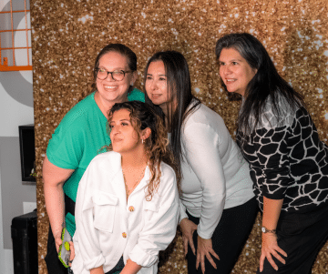 a group of people posing for the camera