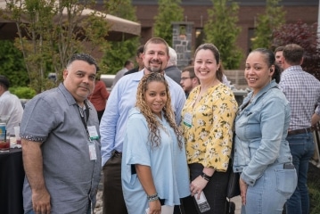 a group of people posing for the camera