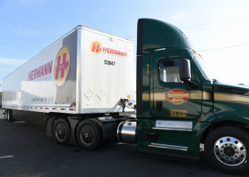 a truck is parked on the side of a road