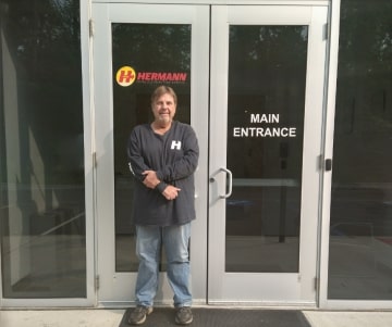 a man standing in front of a door