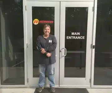 a man standing in front of a door