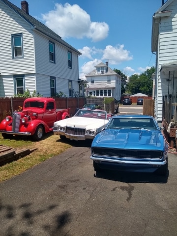 a car parked in front of a house