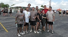 a group of people posing for the camera