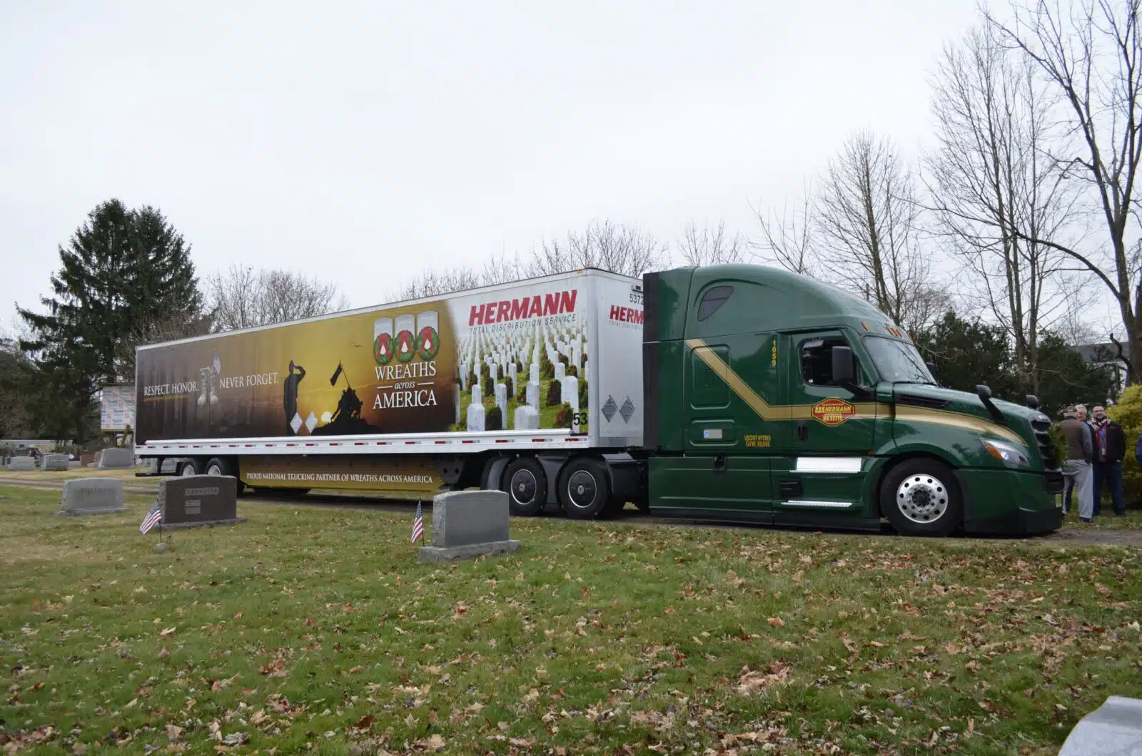 a truck is parked in the grass