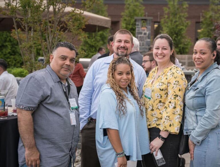 a group of people posing for the camera