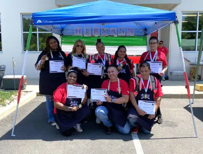 Group shot of people holding certificates